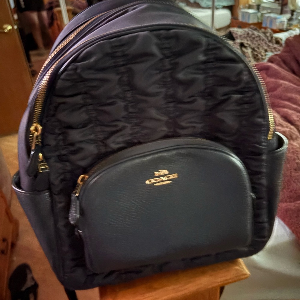 Coach Navy Blue Backpack with Gold Accents